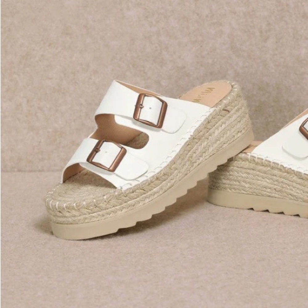 Birkenstock White Slides with Brown Buckles Like new…From Three Birds Nest.